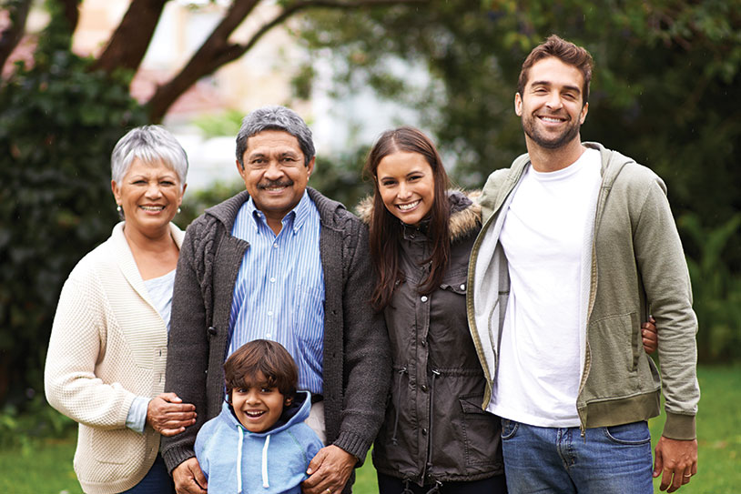A large family smiling. Links to Gifts of Real Estate A large family smiling. Links to Gifts of Real Estate